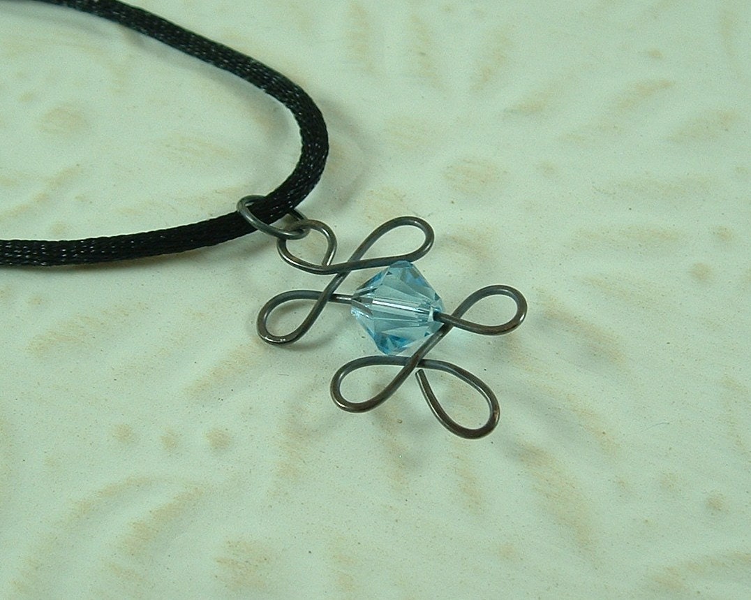 Pendant, Aquamarine crystal, March Birthstone with antiqued sterling sillver wire.....10-PSW-100