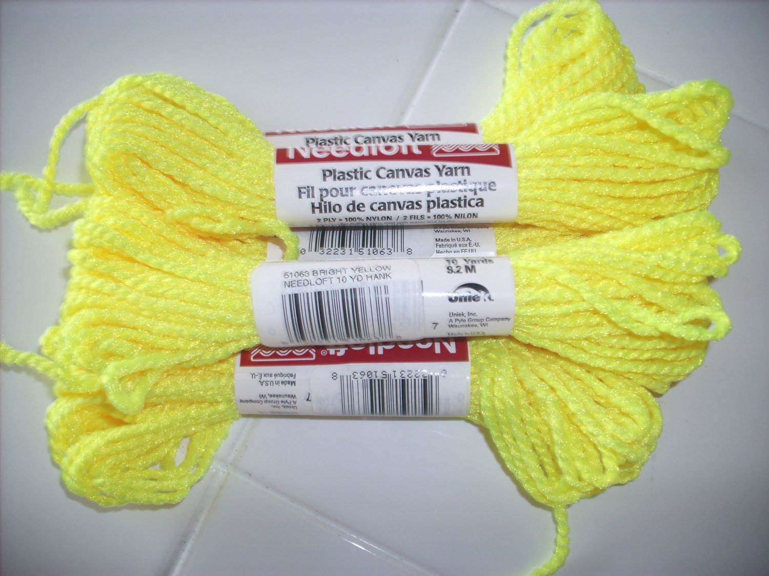 Needloft plastic canvas yarn by Uniek-bright yellow