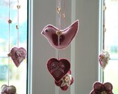 Mobile felt bird with hearts and flowers. Ready to ship. Dusky pink & wine. An original design by Patchwork Pawprint.