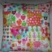 SALE... Last one. Funky, bright patchwork cushion with pompoms, beads, buttons, applique, embroidery.