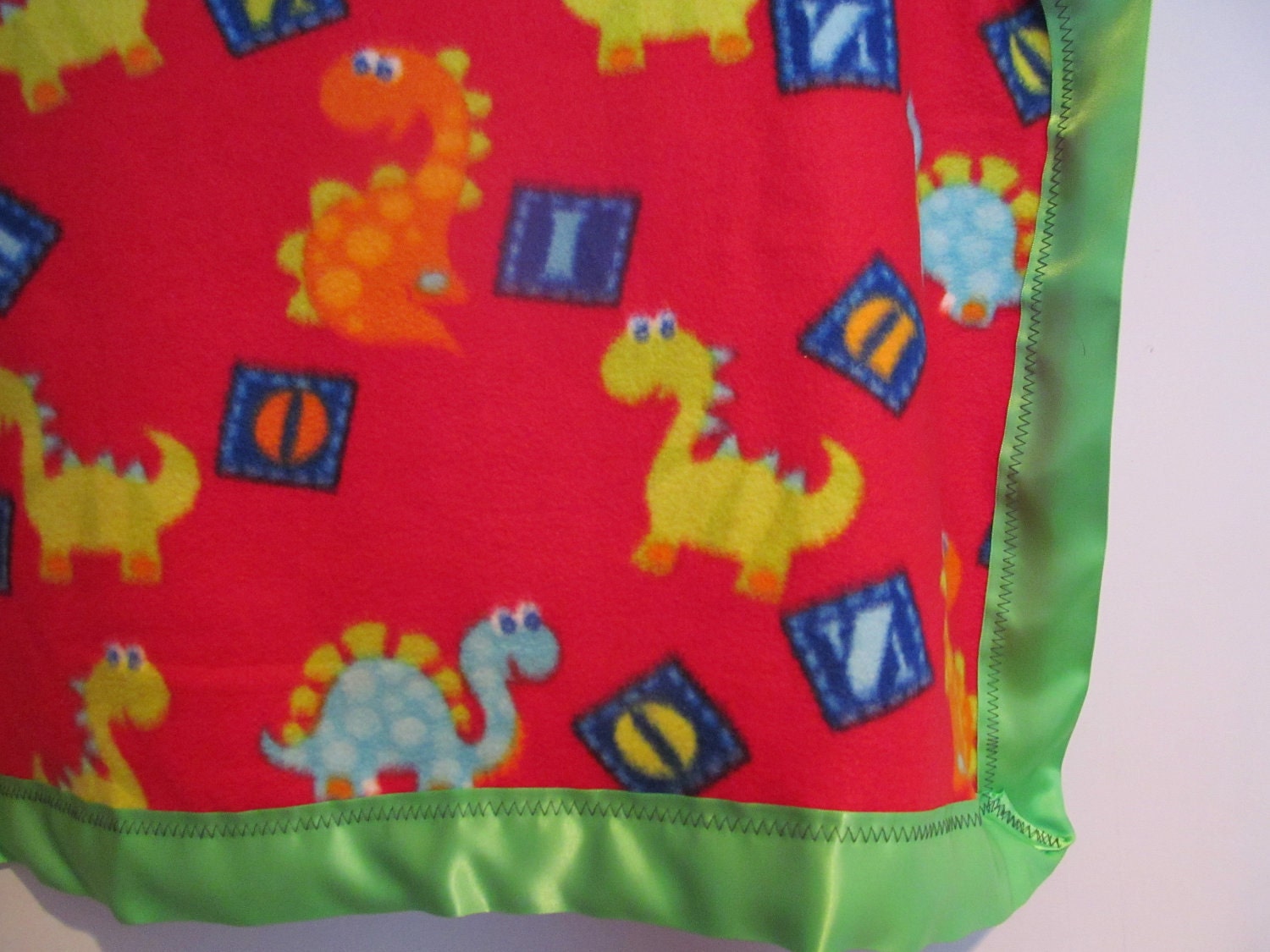 Lucy's Nini Collection - Fleece Dinosaur Blanket