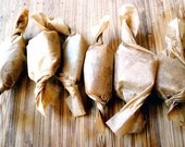 One dozen peanut and vanilla handmade organic fleur de sel caramels