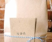 Five 1-dozen bags: 2 almond, 3 classic vanilla organic fleur de sel caramels
