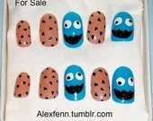 Cookie monster hand painted fake nails.
