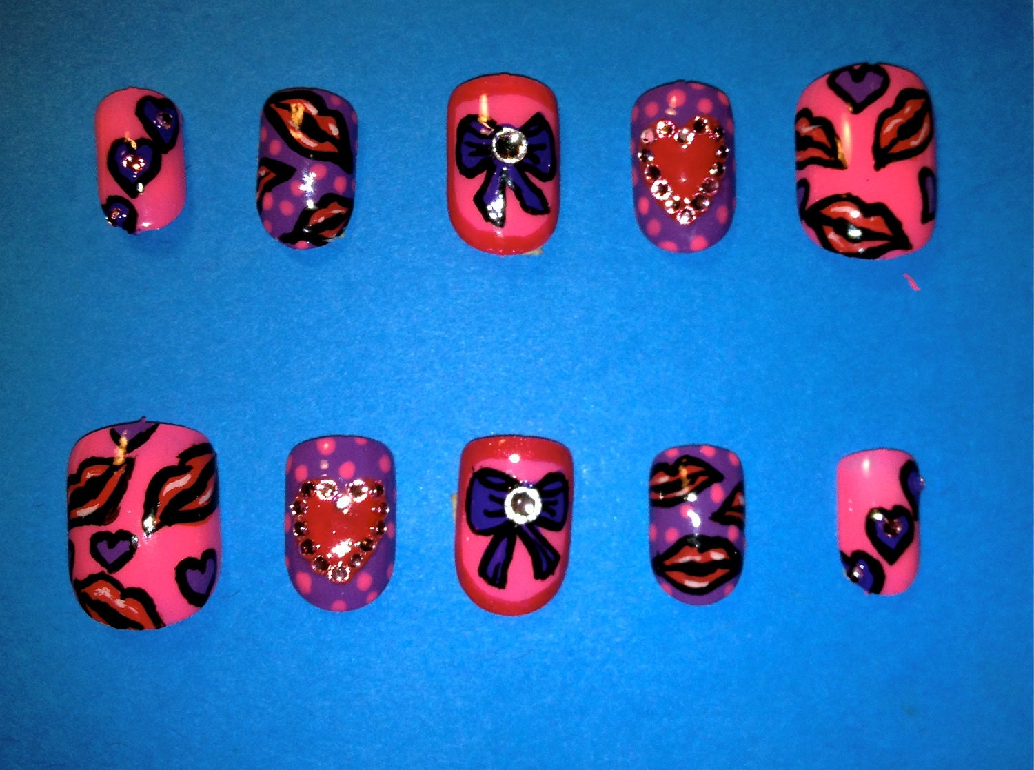 Valentine/girly pink heart and bow nails