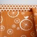 Organic Birdie Spokes in Orange From Birch Fabrics - ONE HALF YARD