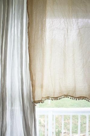 2 Tea dyed flour sack curtain panels with pomms