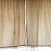 2 Tea dyed flour sack curtain panels with pomms