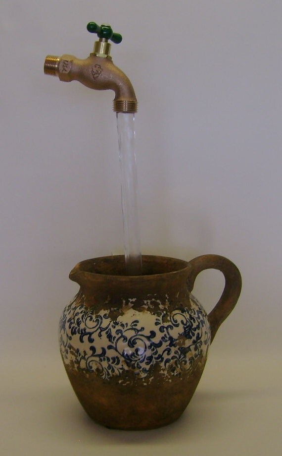 Weathered Pitcher Floating Faucet Fountain by PhantomFountains