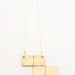 Bronze tetris Z block necklace