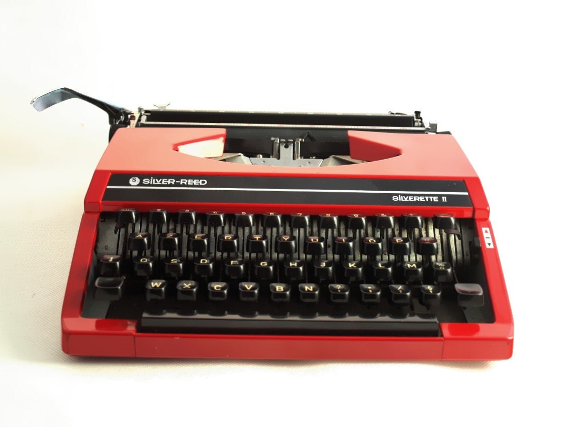 Vintage red manual  typewriter - Silver reed Sillverette II