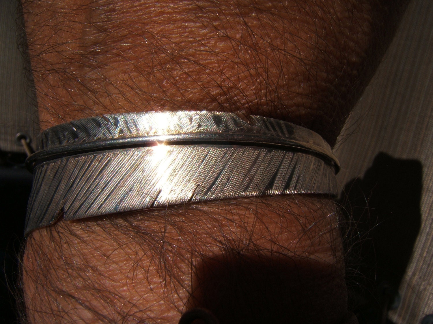 Navajo sterling Feather cuff, signed J. WOOLSEY.......unisex bracelet 5 inch ....