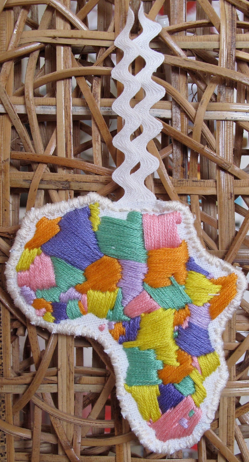 Africa embroidered ornament in pastels for Kwanzaa or Christmas