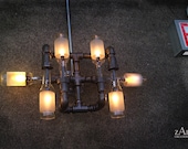 Wall Lamp. Beer bottles. Plumbing pipe & fittings. Wall light. Lighting Fixture.
