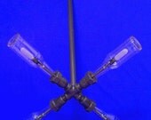 Chandelier "X". Beer bottles, Plumbing pipe and fittings.