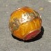 Tibetan beeswax pendant bead with coral, turquoise and brass inlay