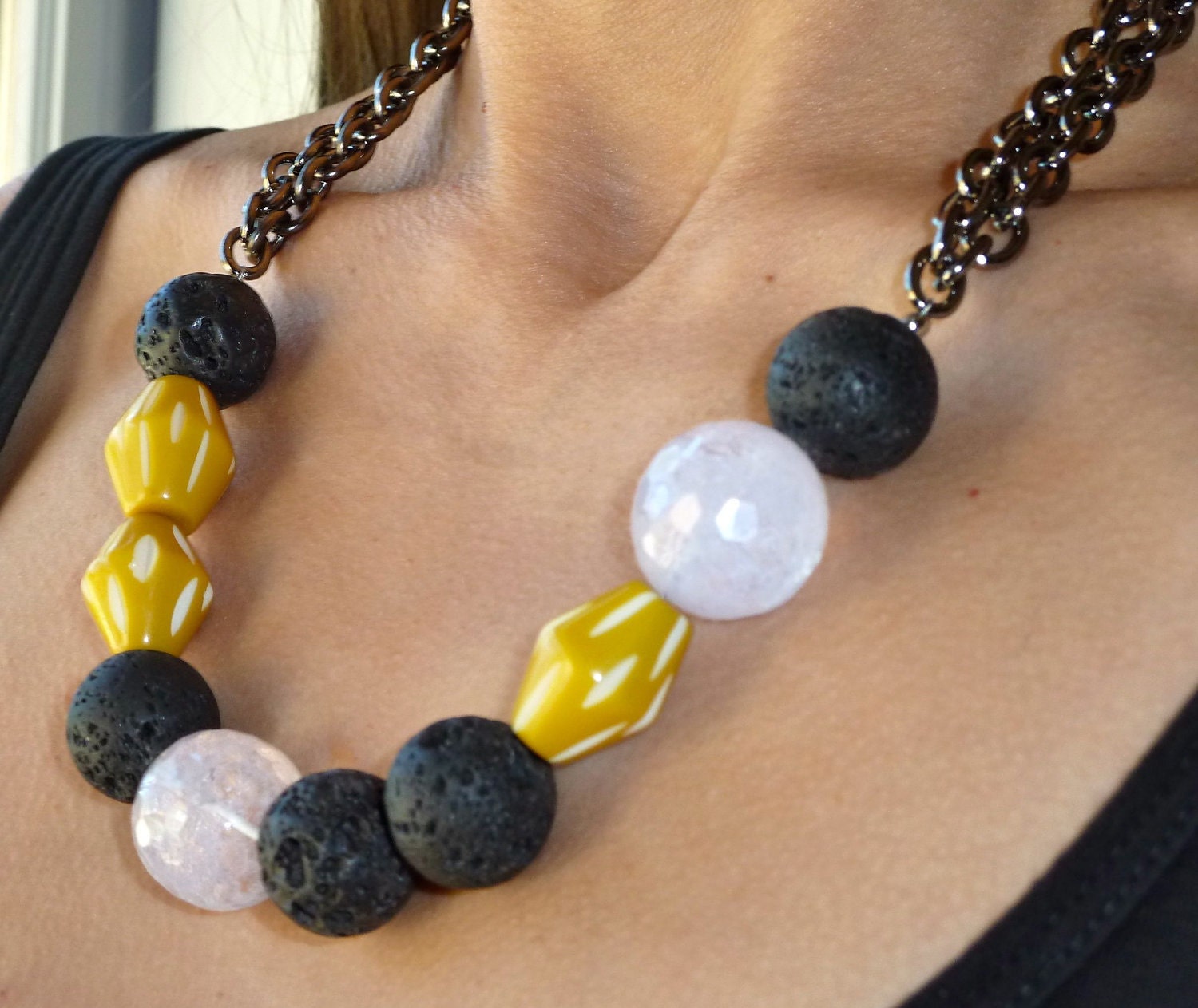 Yellow, black and white beaded necklace with chain