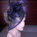 Black fascinator with black feather accents Black sinamay fascinator.