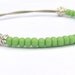 Apple Green & Sterling Silver Bangle Bracelet // Reclaimed Guitar String, Vintage Green Seed Beads // Stacking Bracelet // Recycled Jewelry
