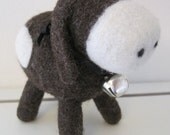 Raphie the needle felted brown, black and white cow