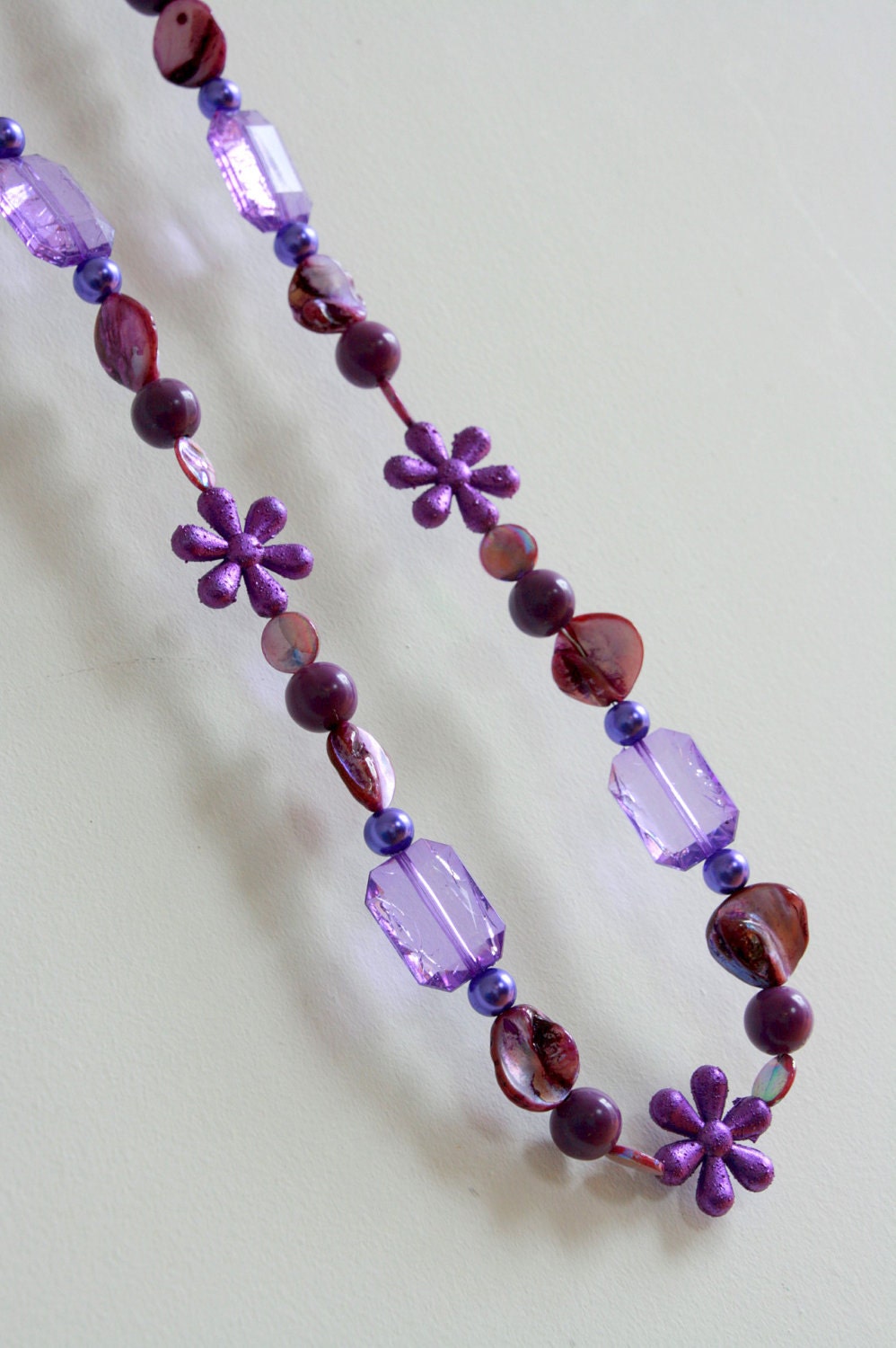 Purple necklace - purple shell, flowers, beads, jewels