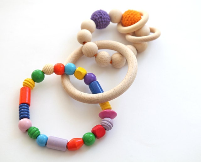 Toddler toy. Colorful wooden ring toy for children baggi.