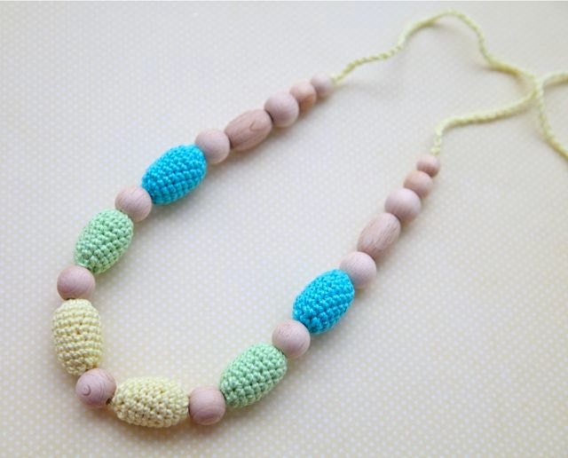 Teething necklace in aqua blue/ turquoise, light yellow and light green. Crochet wooden beads nursing necklace for her.