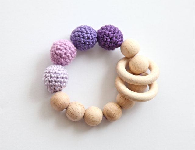 Lavender, lilac, violet teething ring toy with crochet wooden beads. Rattle for baby.