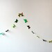 Green paper butterflies garland - wall decor