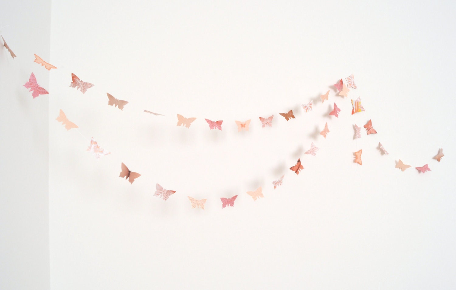 Peach and antique pink paper butterflies garland - wall decor