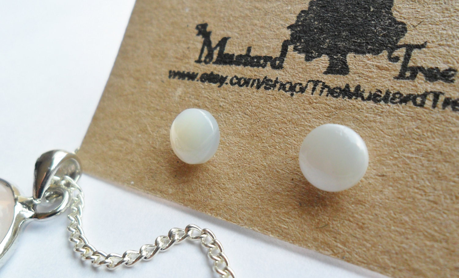 White mother of pearl stud earrings