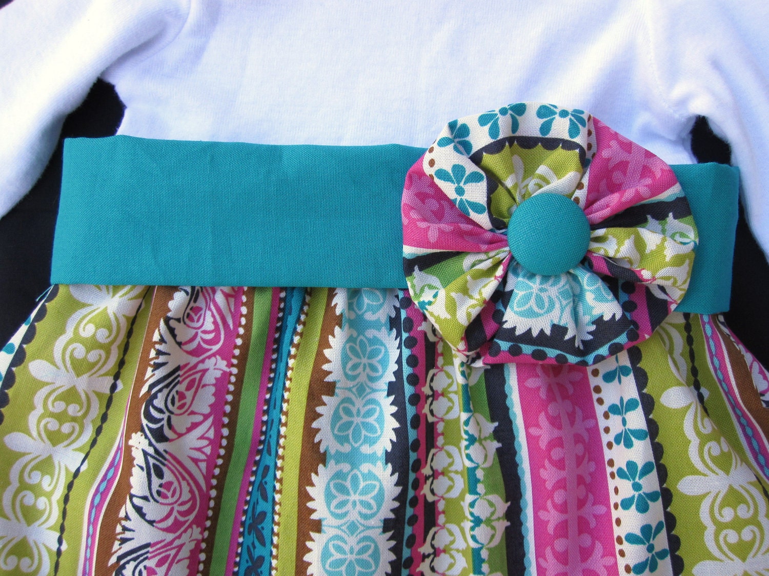 Multi Colored Striped Onesie Dress with Removable Belt and Fabric Flower