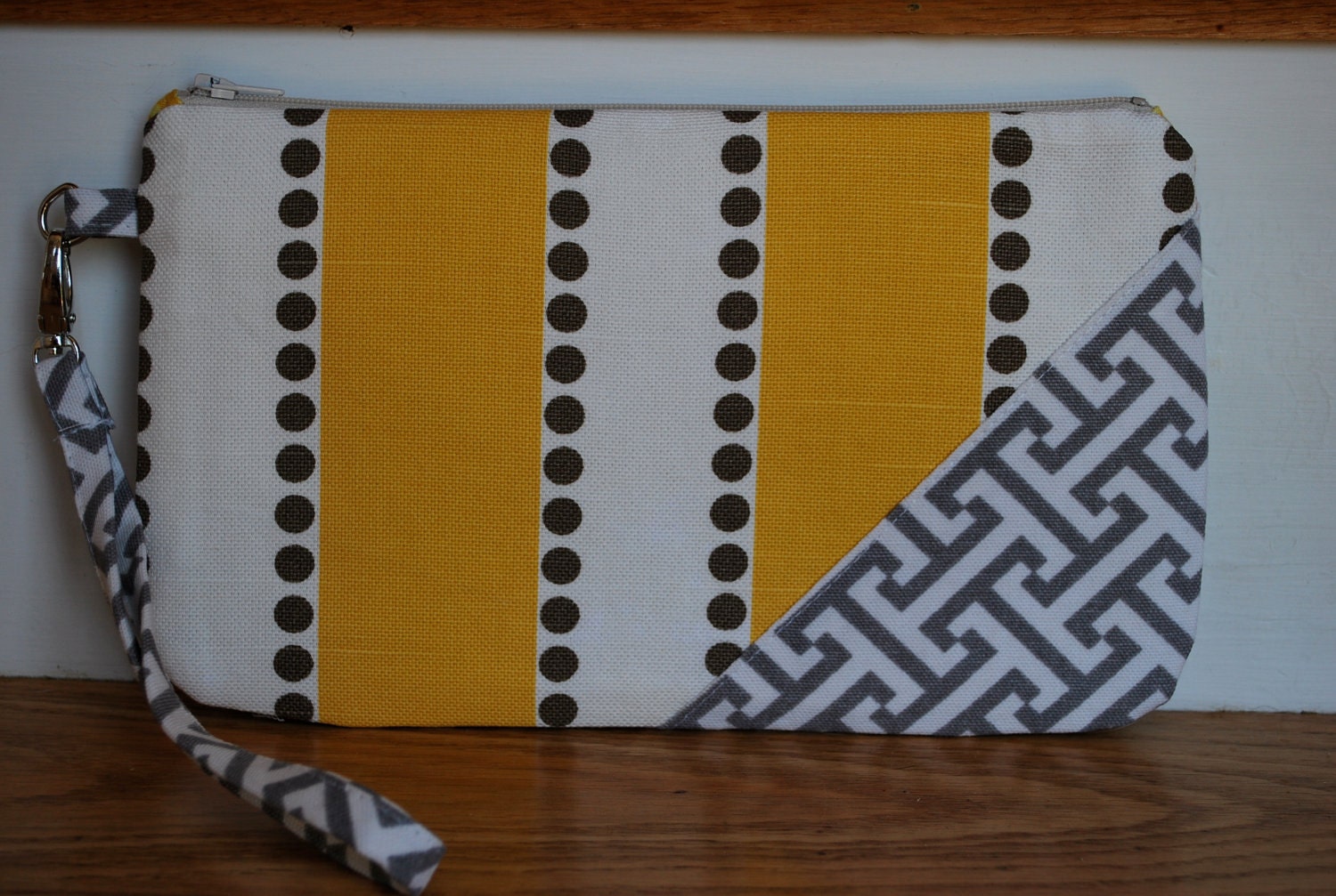 Wristlet yellow, grey and white with zipper closure