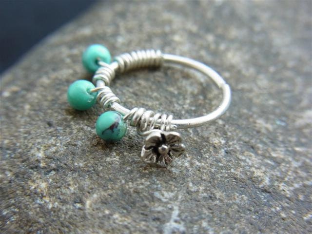 Oxidized silver flower wrapped with Tiny turquoise beads seamless hoop