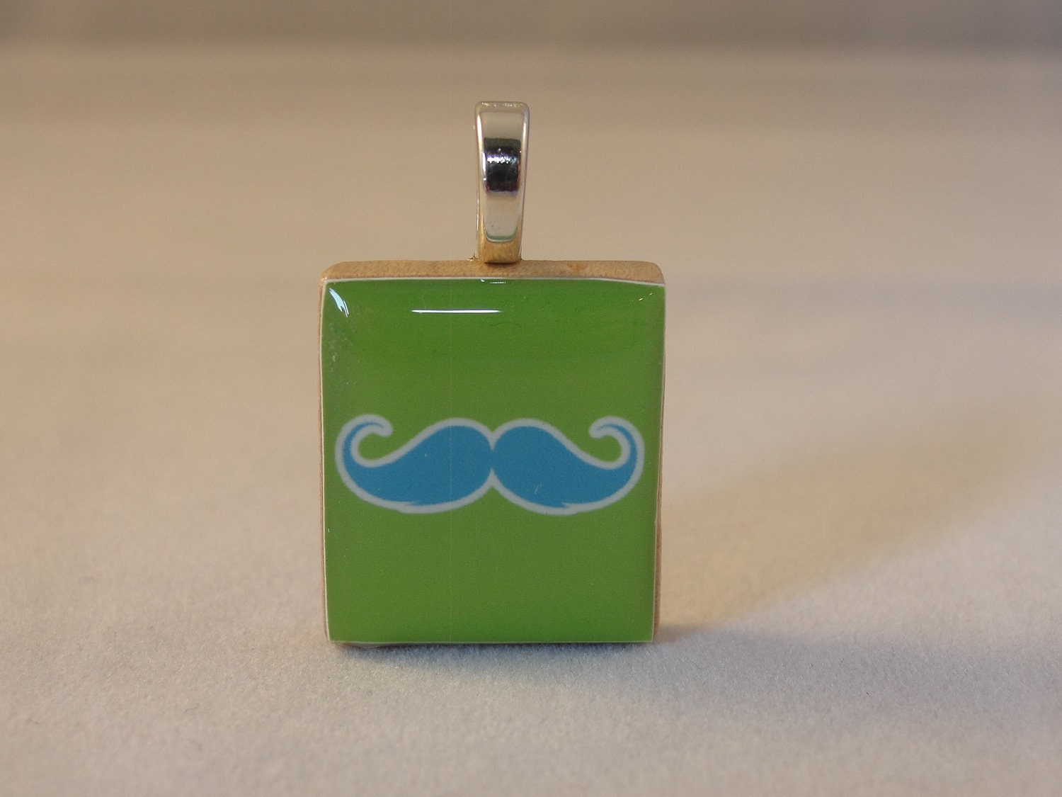Blue Mustache Green Background Pendant