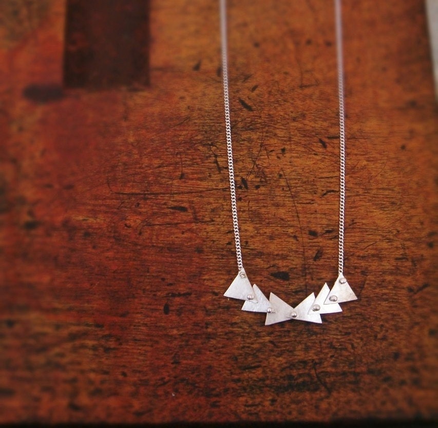 follow necklace in sterling silver articulated triangles