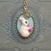 Whimsical needle felted bunny holding a red and pink flowers bouquet pendant necklace, spring & Easter item