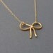 Sweet Bow Gold Necklace also in Silver