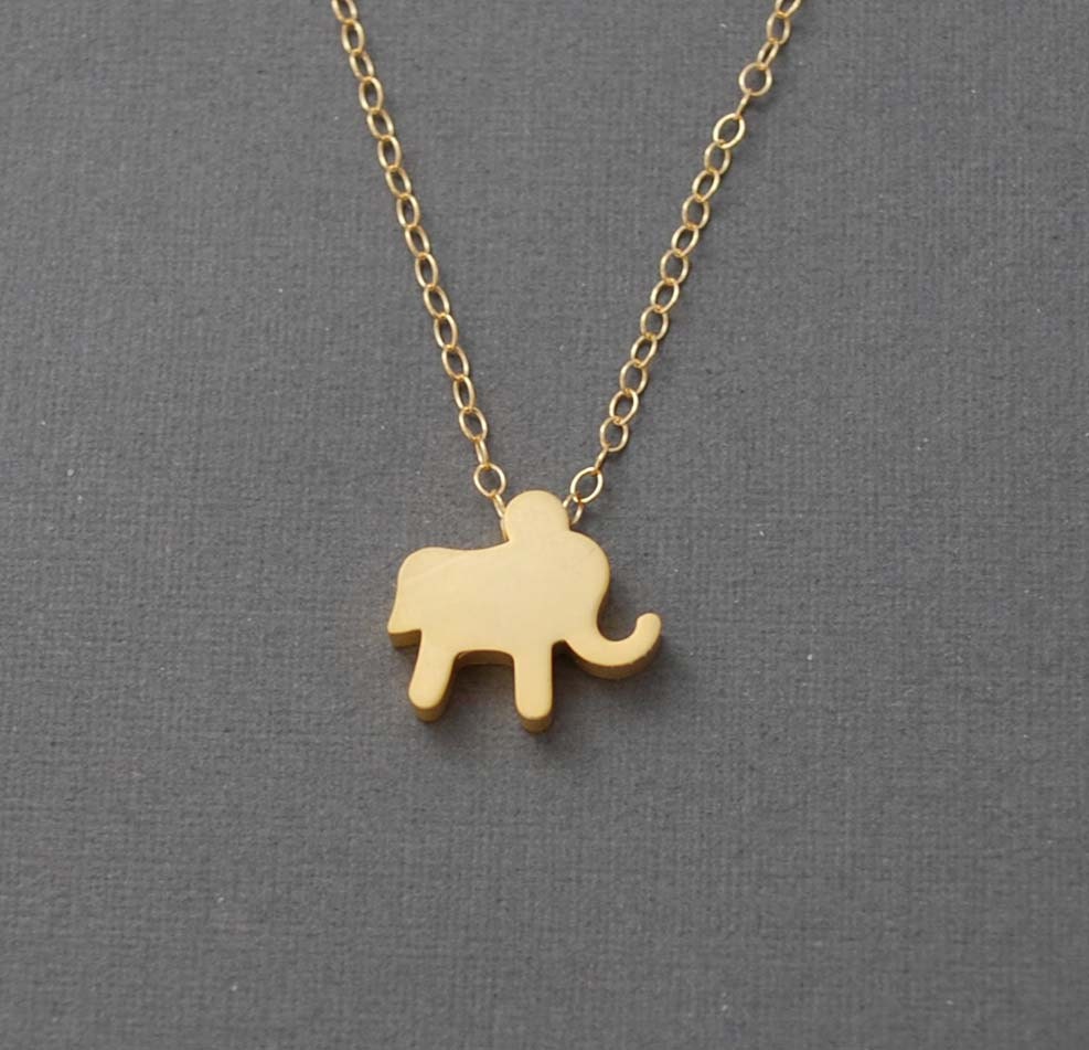 Tiny Elephant Necklace available in  Gold or Silver