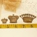 3 stamped aged brass crowns
