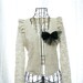 Romantic Ivory Lace Cropped Jacket Ruffles shoulder silky lining with a black polka dot bow brooch