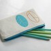 Spring pencil pouch screen printed in orange and turquoise