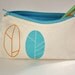 Spring pencil pouch screen printed in orange and turquoise