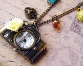 Summer time - a pocketwatch and vintage camera necklace