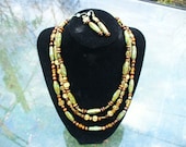 Dramatic green and brown three strand necklace and earring set
