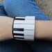 Leather cuff bracelet hand carved & hand painted - Piano keys design