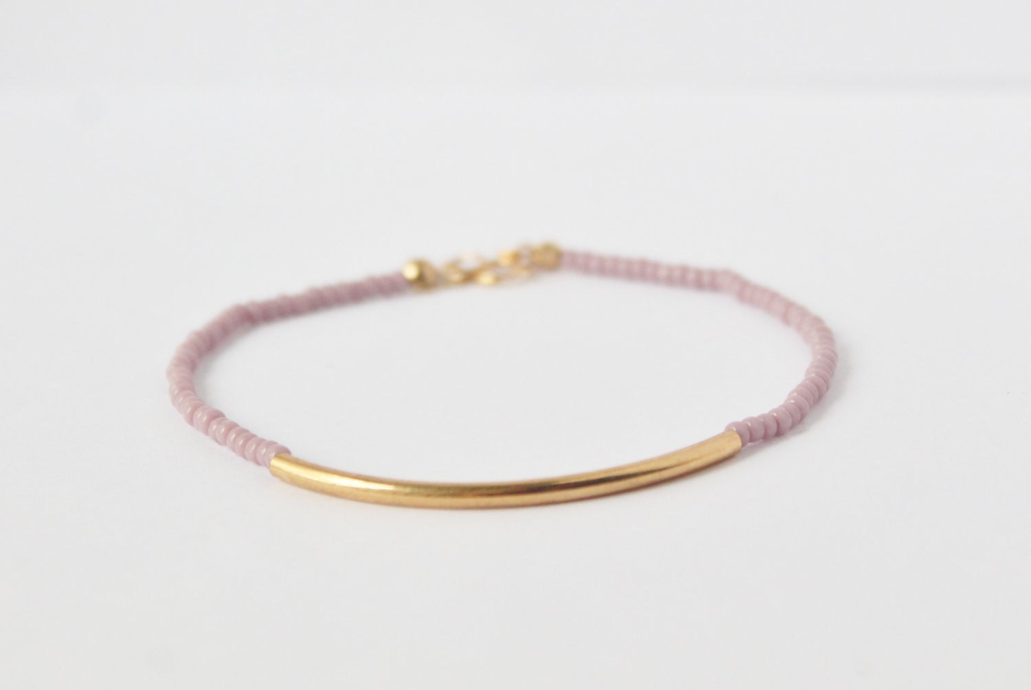 Mauve gold bar seed bead bracelet - skinny purple beaded - gold plated tube - minimalist modern jewelry by fildee