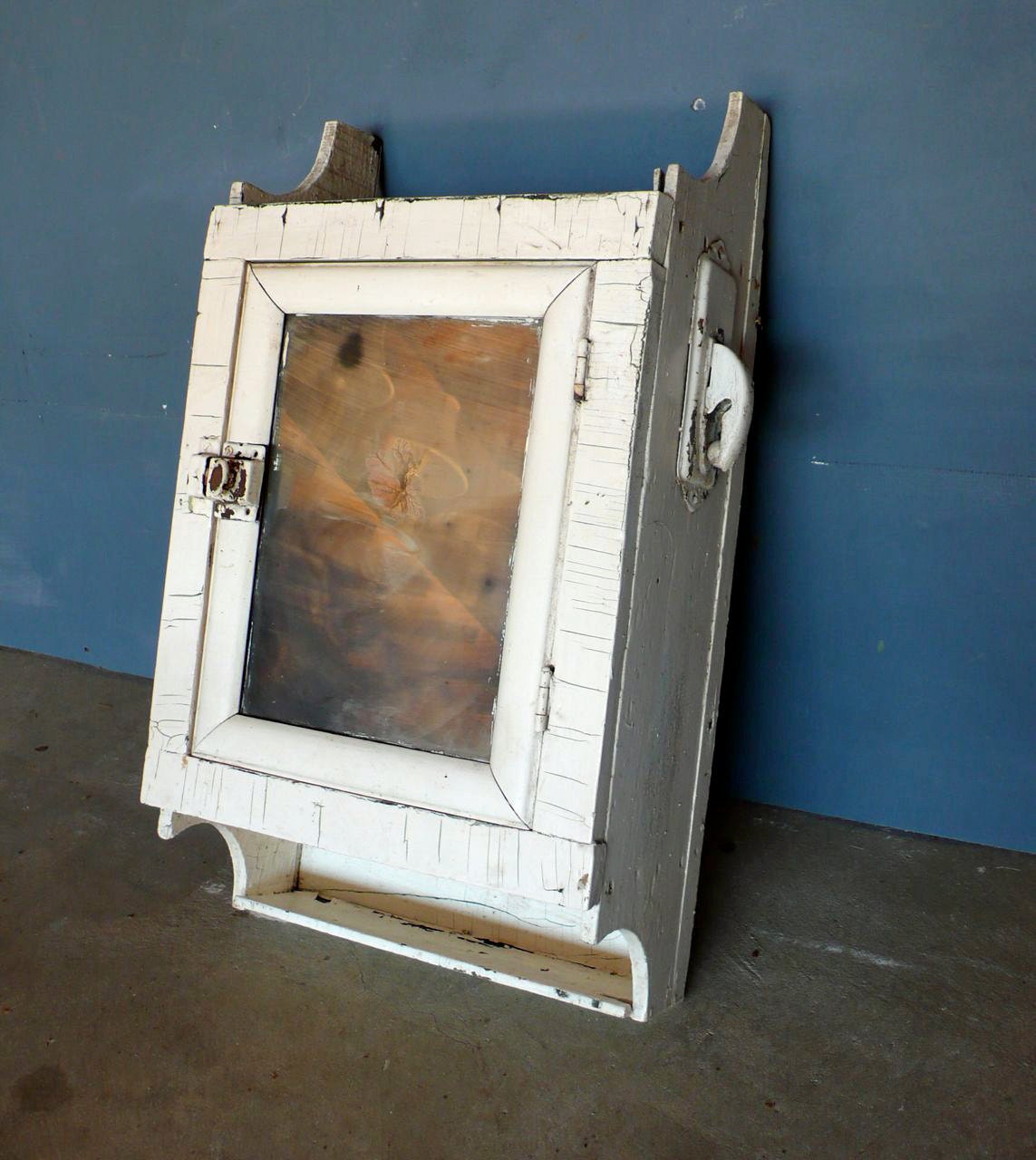 Vintage primitive medicine cabinet.