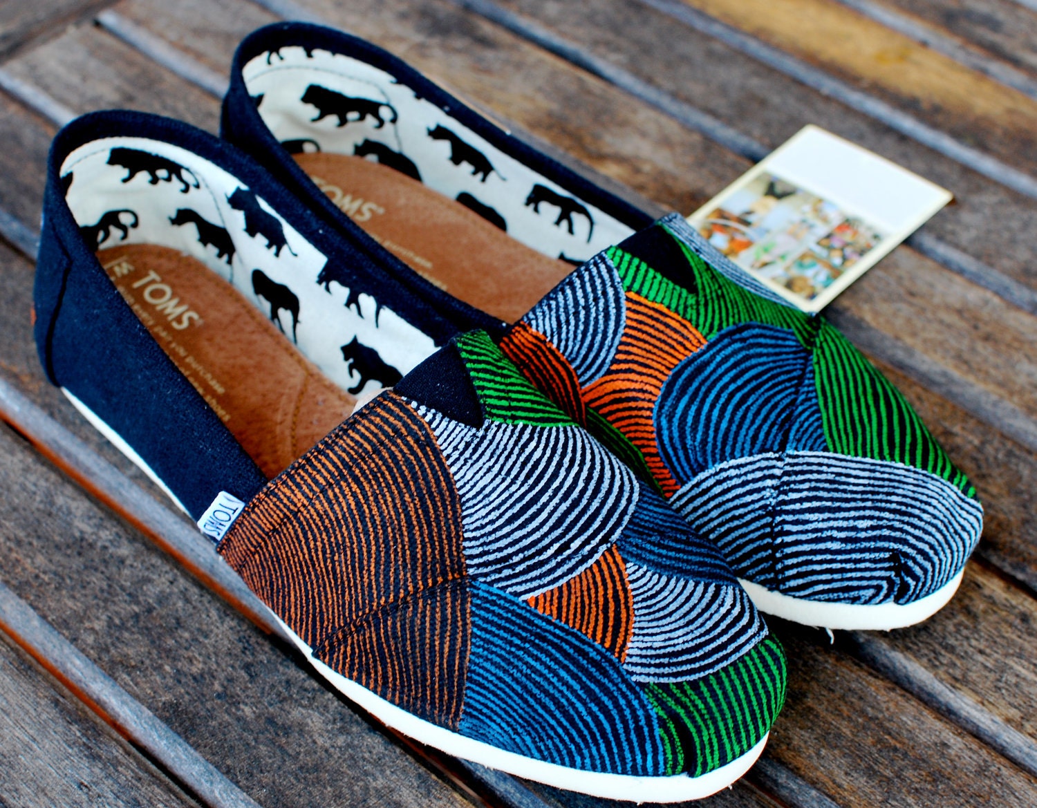 Colorful pinstripe TOMS shoes