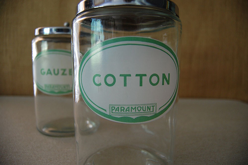vintage medical or apothecary cotton and gauze glass jars